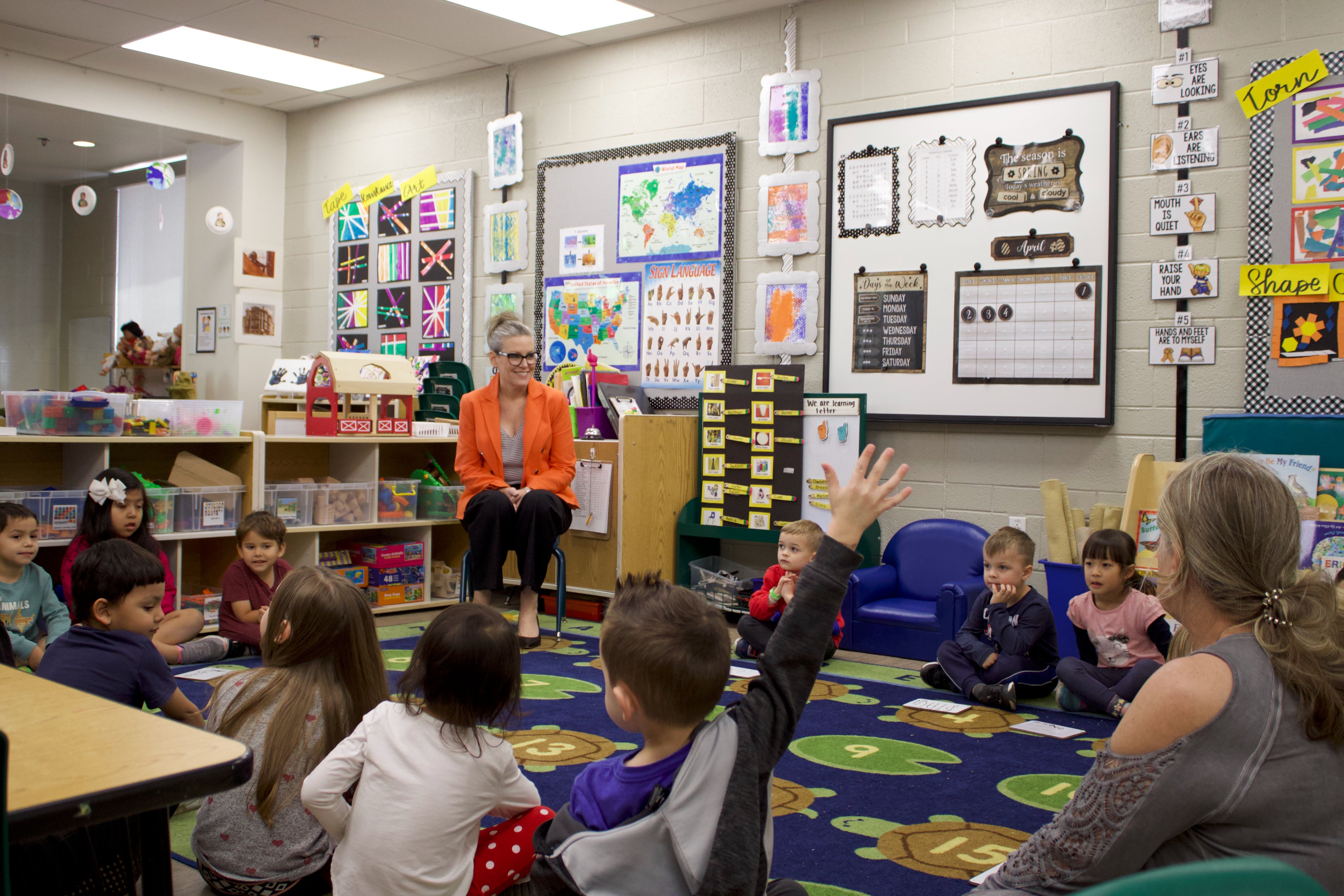 Governor Katie Hobbs taking questions from a classroom of children