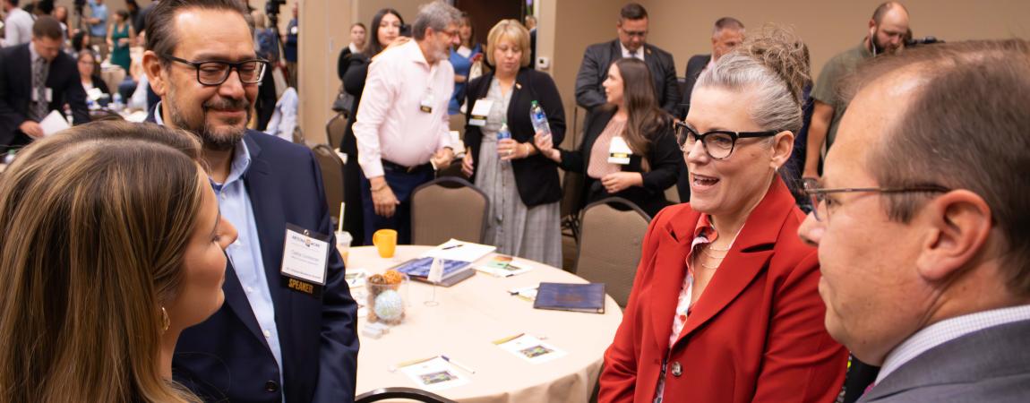 Governor Katie Hobbs conversating during an event.